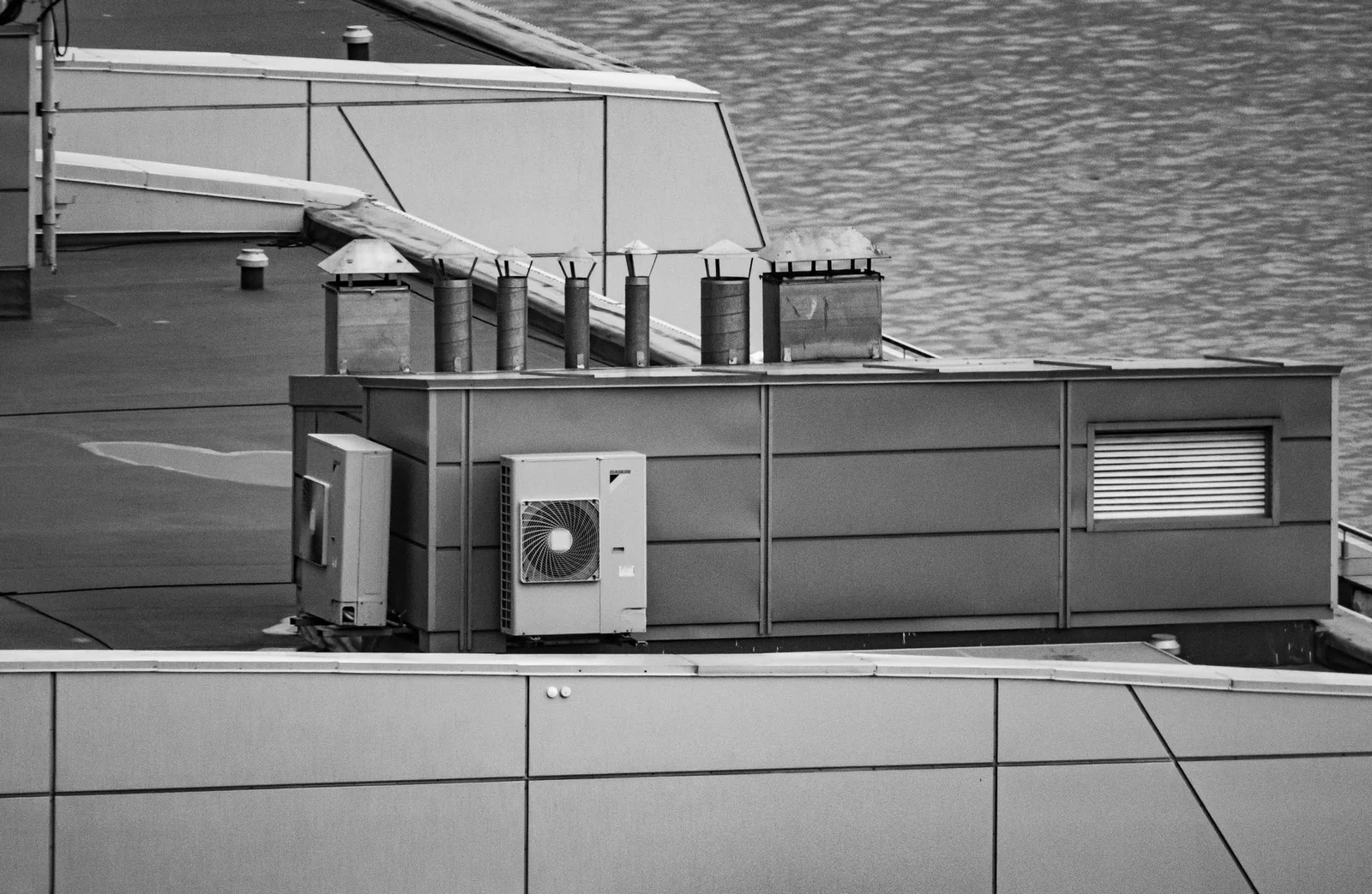 HVAC technician inspecting outdoor condenser unit
